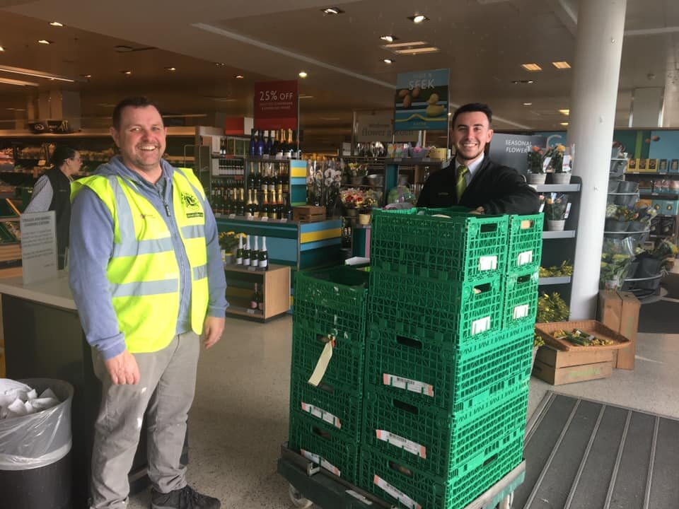 Neil Challen, licensee of the Railway hotel, takes a food donation from Waitrose for the pub’s community kitchen