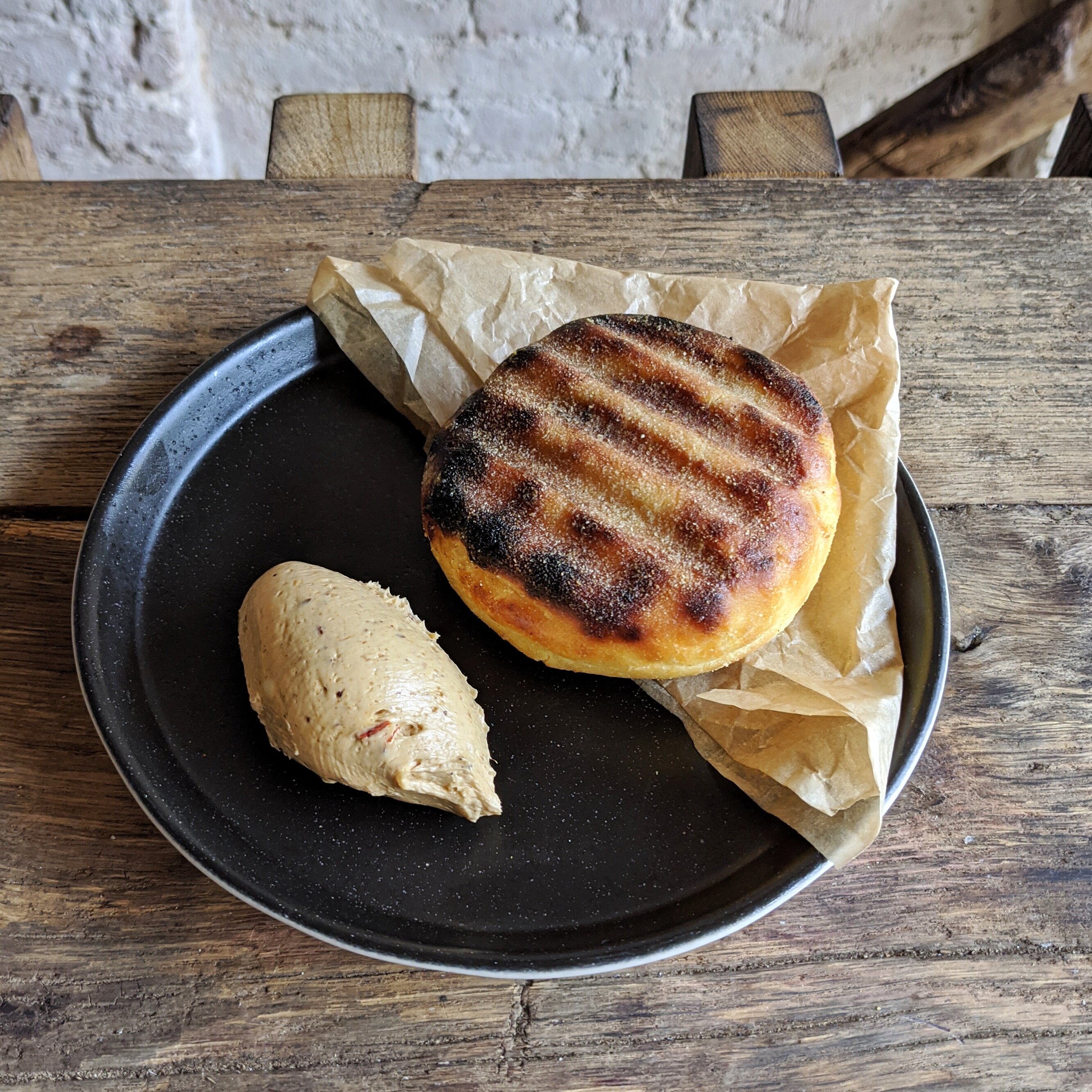 Grilled potato bread, chilli crab butter