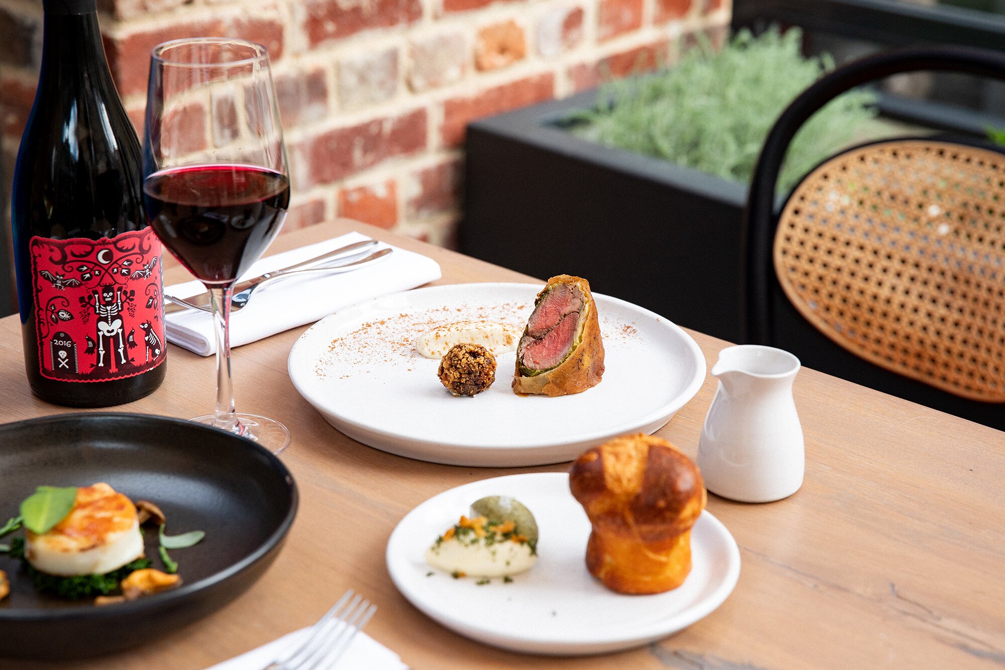 Pigeon breast and leg, Savoy cabbage, offal, mushroom, celeriac, Medjool date (top), and homemade brioche