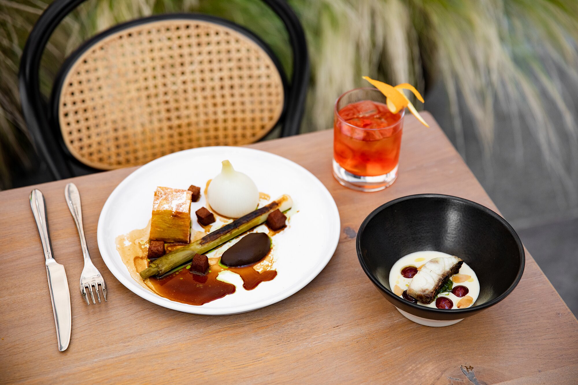 ‘Beef and Beer’ (left), and sardine, ajoblanco, smoked almond, cucumber and Granny Smith apple salad, smoked olive oil