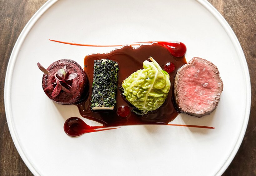 Devon venison loin, braised haunch wrapped in cabbage, gnocchi, beetroot, juniper jus