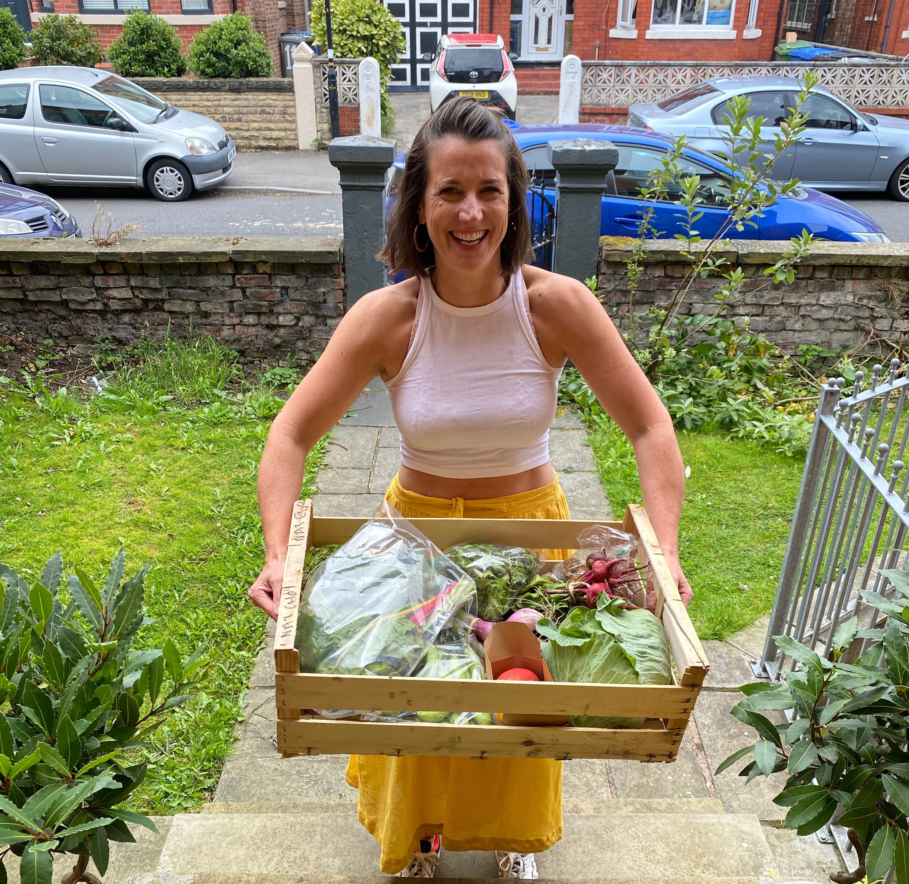 Kathleen O’Connor delivering a Marketplace veg box