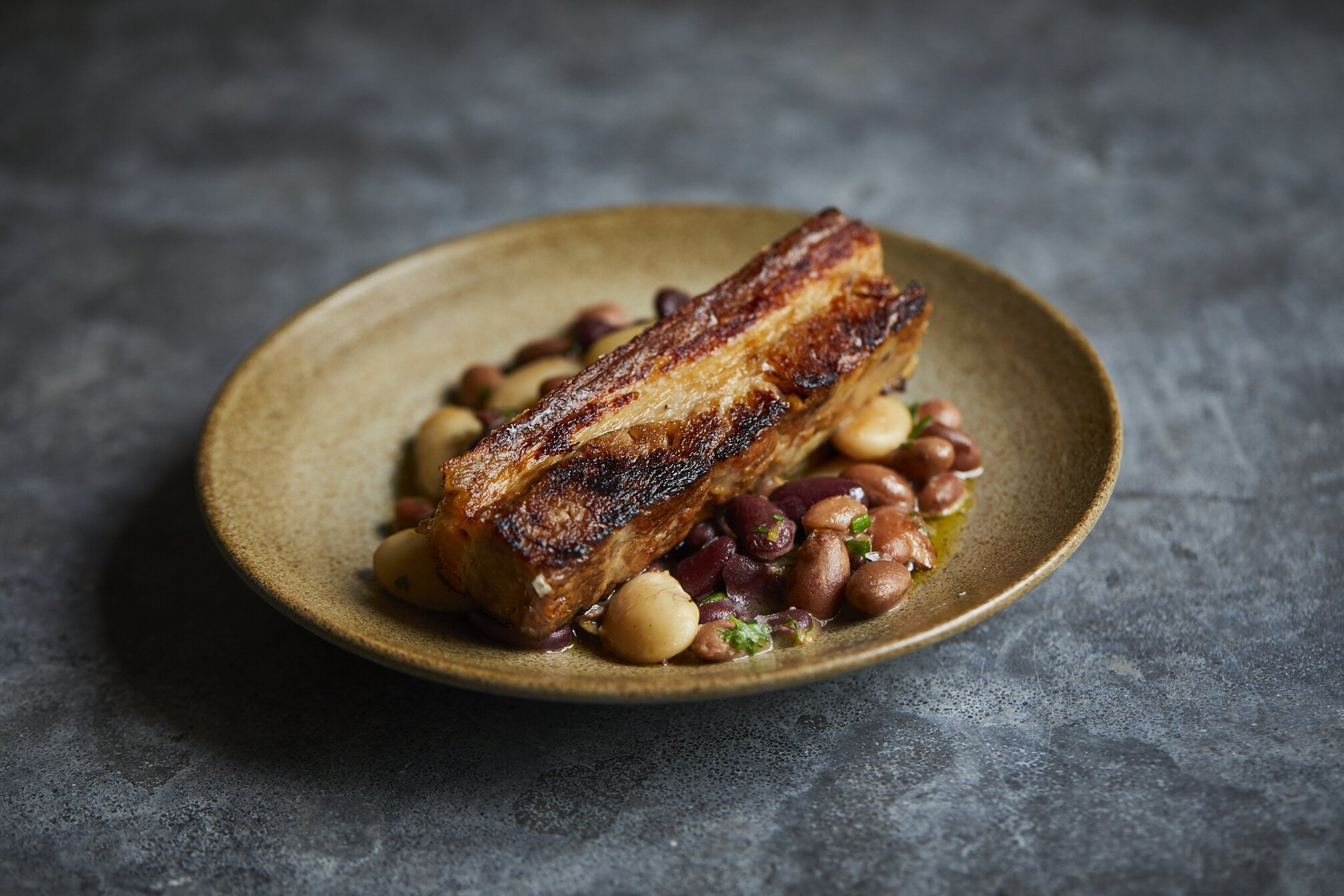 Roast pork belly with an Asturian bean stew.jpg