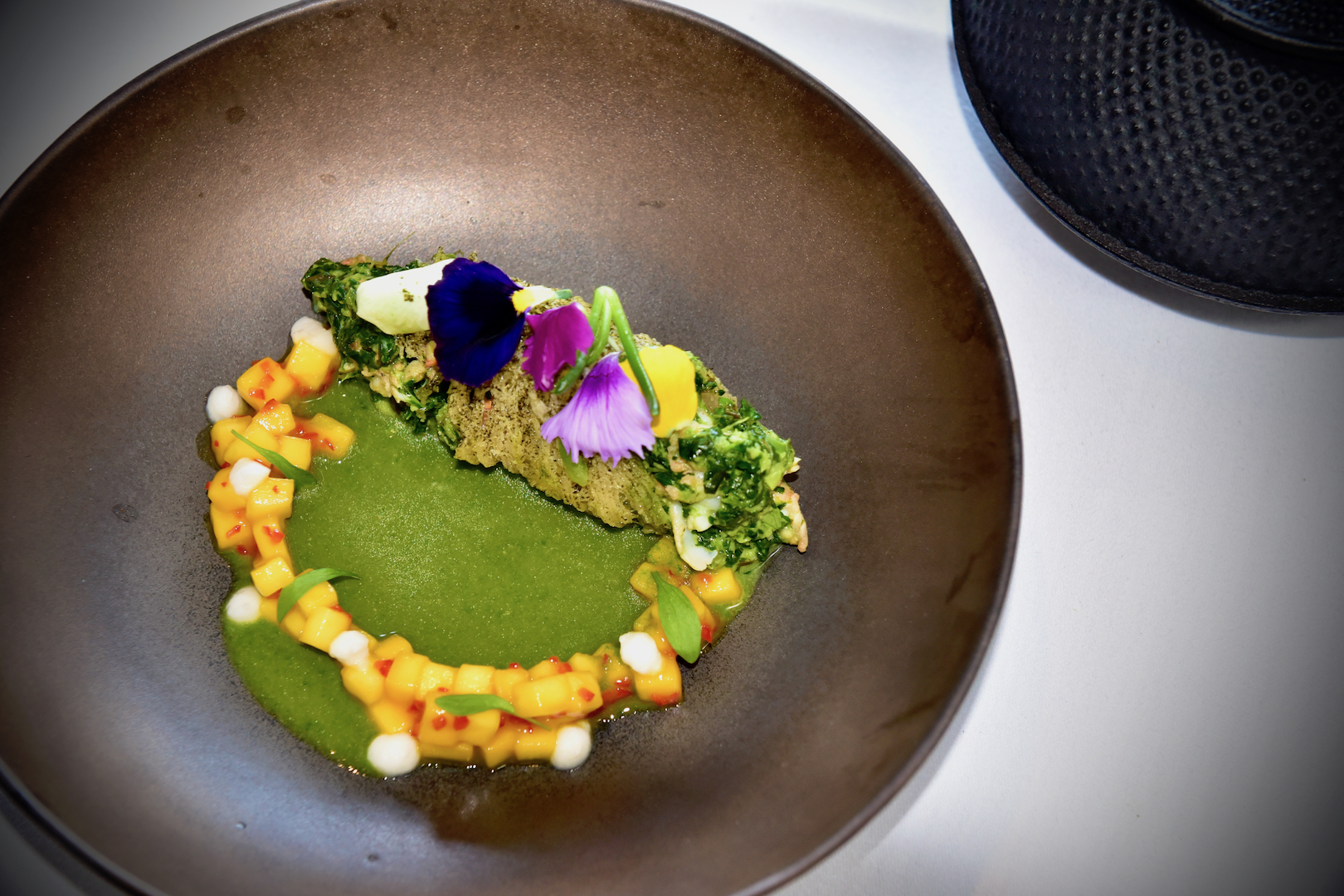 Thai langoustine ‘Mi Krop’ croquette, langoustine and spinach bisque, mango and coconut salsa