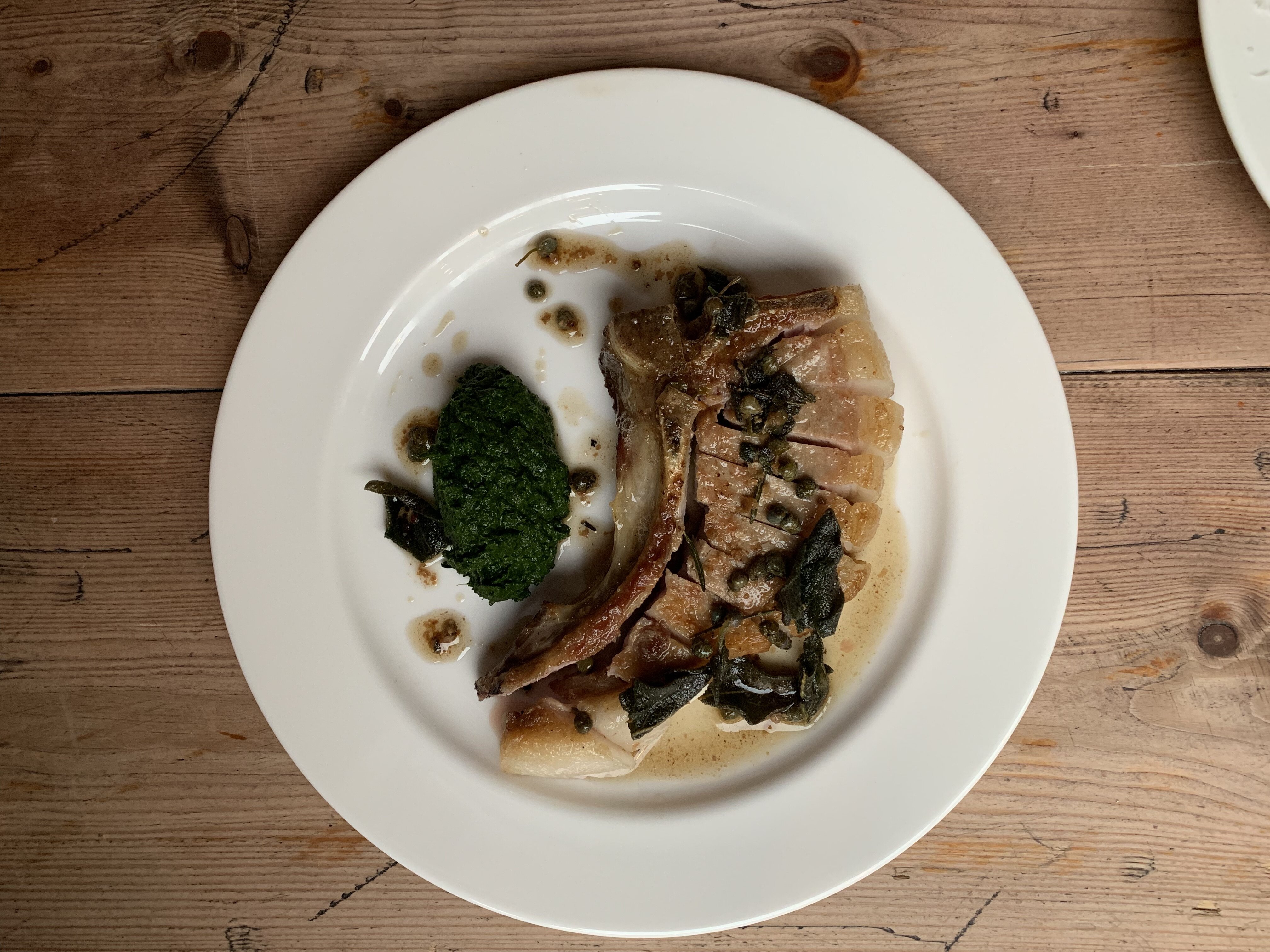 Emile Paddock Farm pork chop, cavolo nero, capers & sage.jpeg